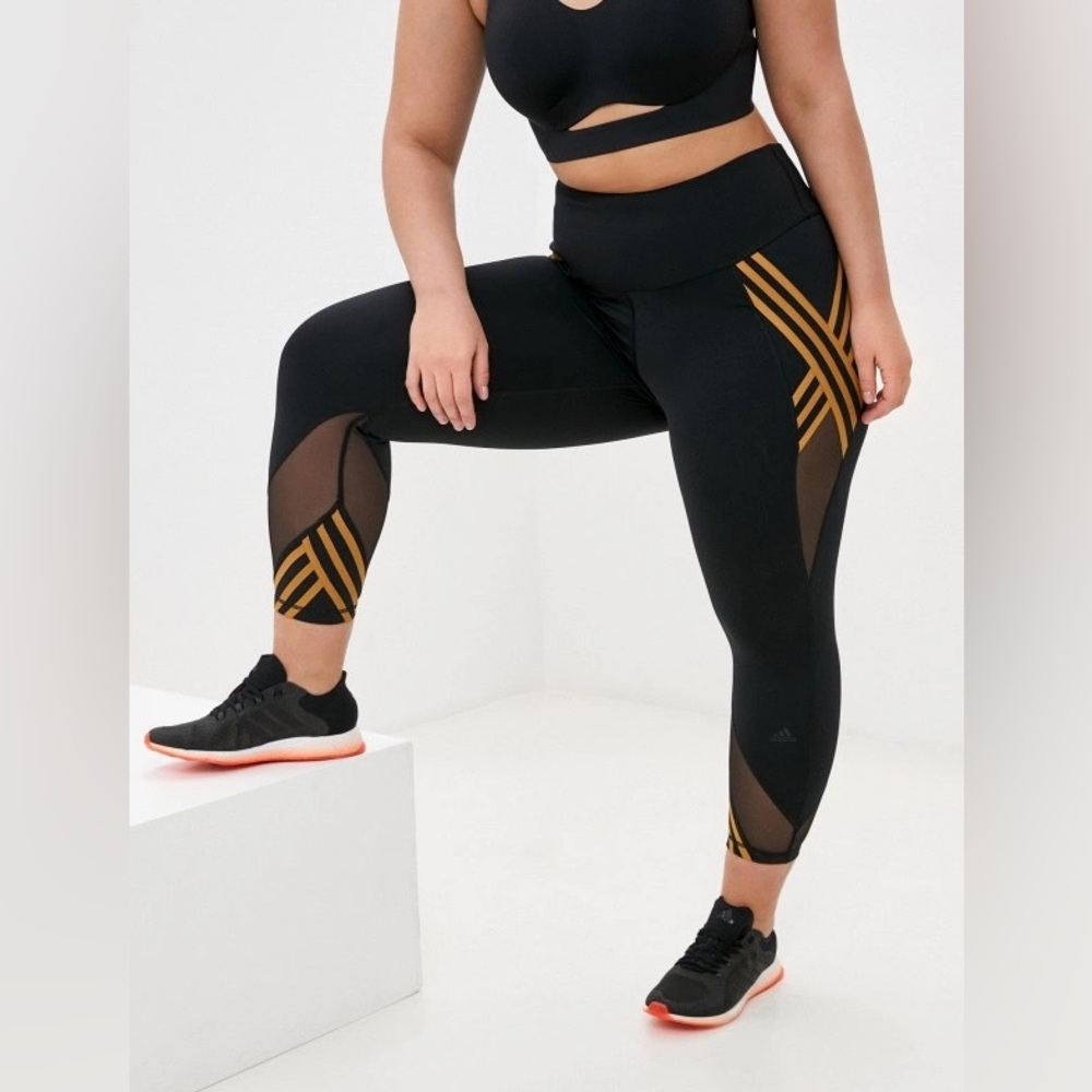 IVY PARK Black and Gold Leggings